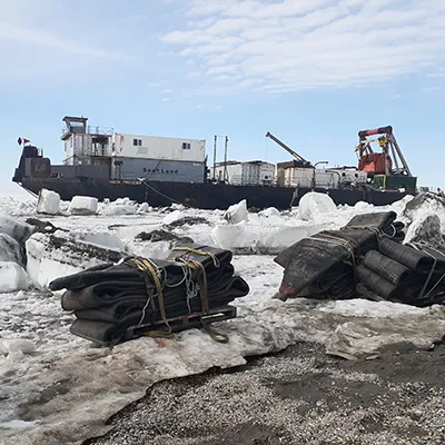 Vessel surrounded by ice and parts